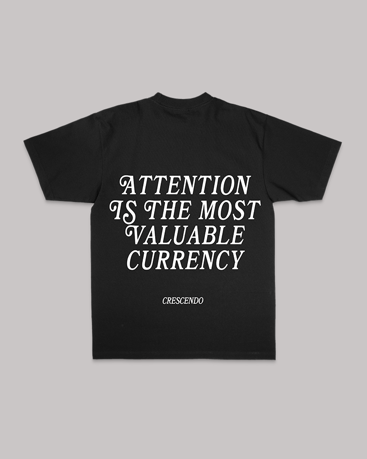 ATTENTION CURRENCY BLACK TEE