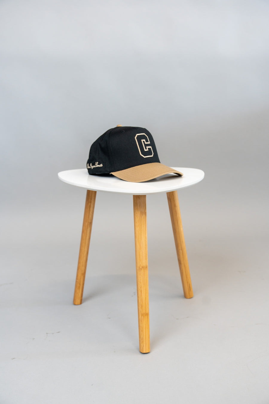 COLLEGIATE C BLACK/TAN SNAPBACK