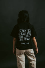 ATTENTION CURRENCY BLACK TEE