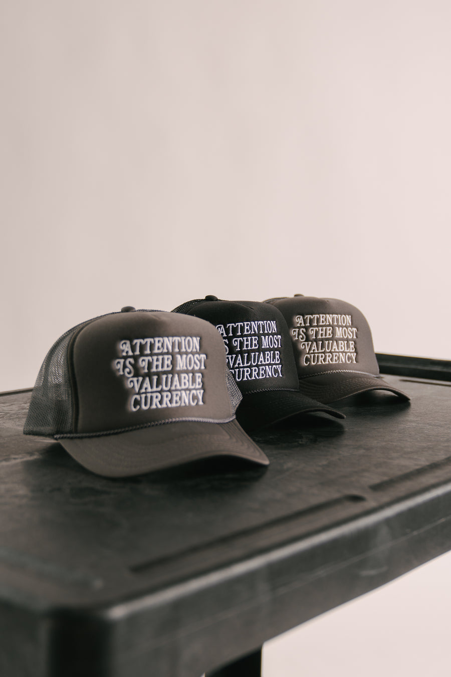 ATTENTION CURRENCY GRAY TRUCKER